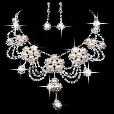 Luxury Rhinestone & Faux Pearl Bridal Jewelry Set close-up of sparkling rhinestones and round faux pearls on black background