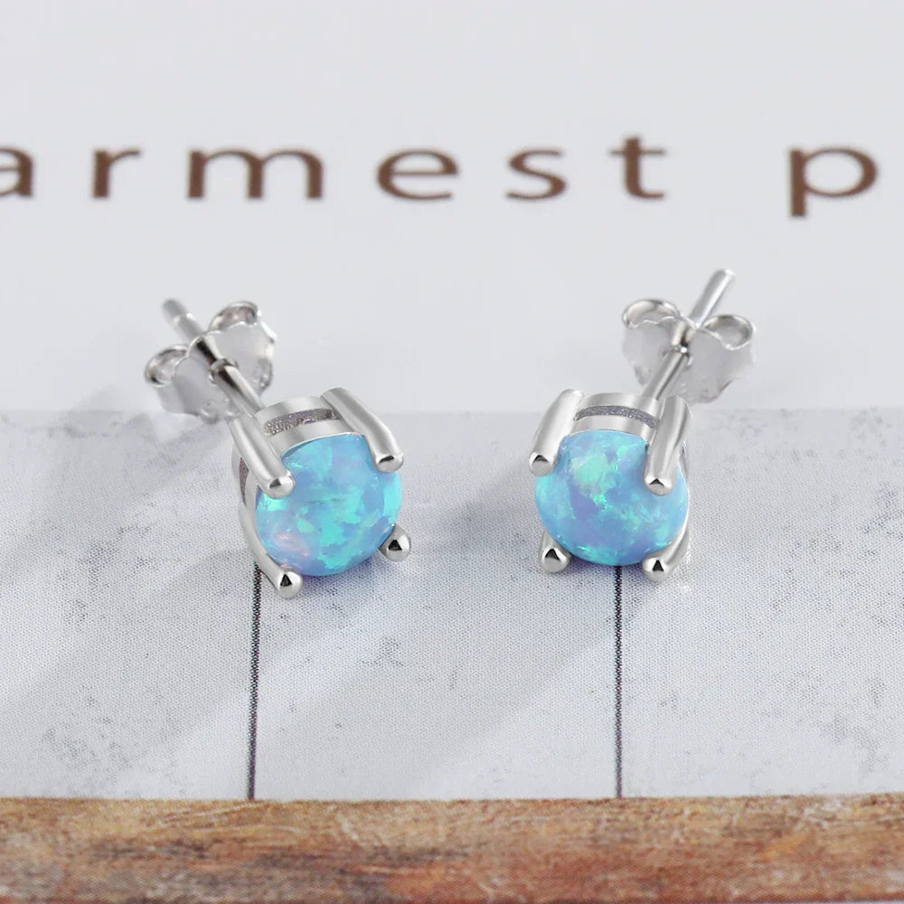 Classic Opal Earrings 925 Sterling Silver small 4 mm simulated opal studs displayed on white background. 