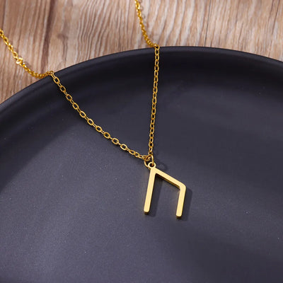 Stainless Steel Necklace Amulet  for Women on black background highlighting talisman detail.