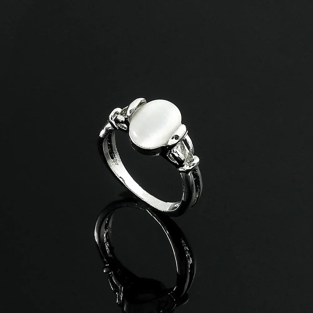 Twilight Saga Bella Ring Silver Plated Opal Jewelry close-up of polished silver plating and luminous opal centerpiece.