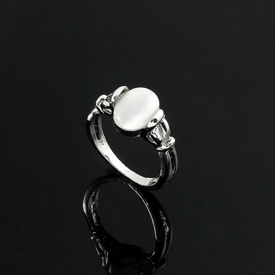 Twilight Saga Bella Ring Silver Plated Opal Jewelry close-up of polished silver plating and luminous opal centerpiece.