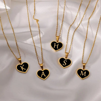 Heart-shaped initial letter necklaces on gold chains for women, stainless steel jewelry.