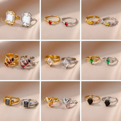 Luxury gold-tone stainless steel rings with simulated gemstones in various designs.