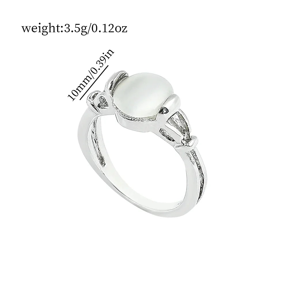 Twilight Saga Bella Ring Silver Plated Opal Jewelry on white background showcasing opal’s iridescent flashes.