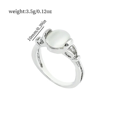 Twilight Saga Bella Ring Silver Plated Opal Jewelry on white background showcasing opal’s iridescent flashes.