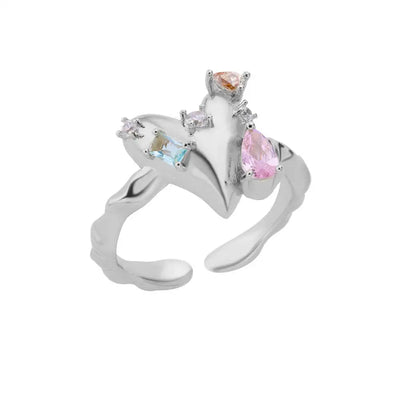 Gold-Tone Stainless Steel Ring Simulated Gemstone on white background highlighting stone’s sparkle.