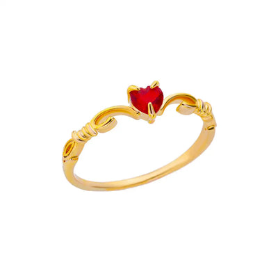 Anillo de acero inoxidable de lujo en tono dorado con piedra preciosa simulada.