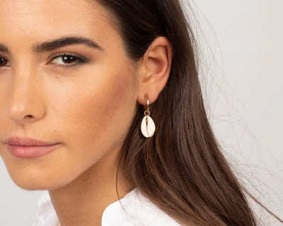 Cowrie shell earrings.