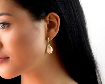 Cowrie shell earrings.
