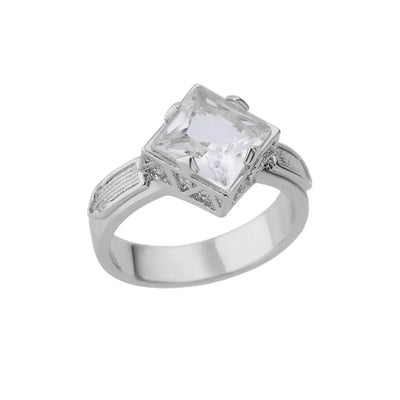 Anillo de acero inoxidable de lujo en tono dorado con piedra preciosa simulada.