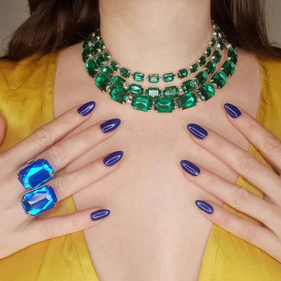 Stonefans colourful square rhinestone necklace and ring set modelled on woman in yellow top.