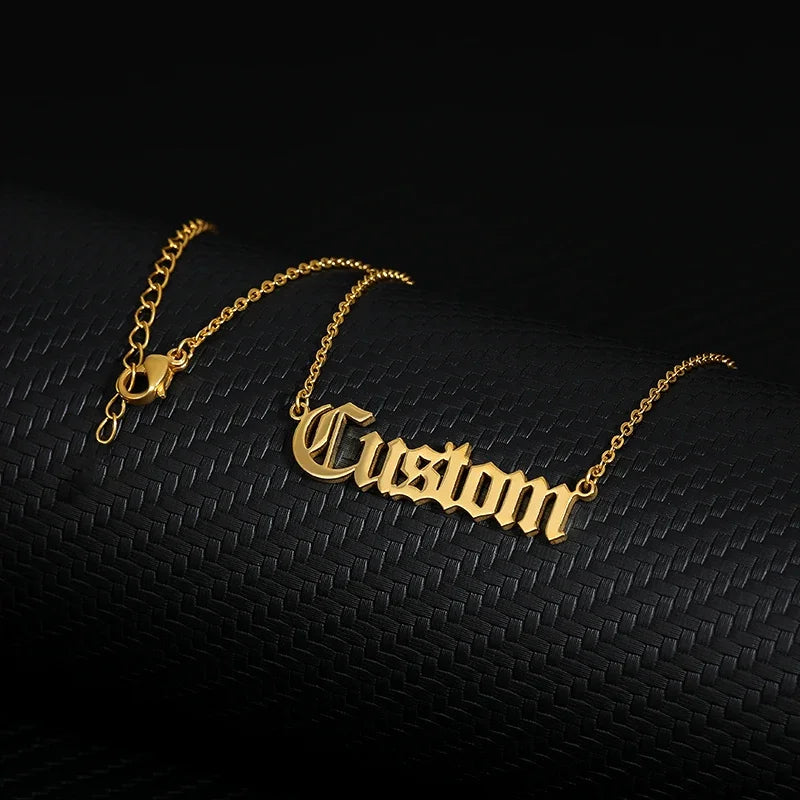 Old English Custom Name Necklace Personalized Gothic Style on black mannequin showcasing Gothic lettering. 