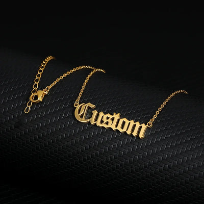 Old English Custom Name Necklace Personalized Gothic Style on black mannequin showcasing Gothic lettering. 